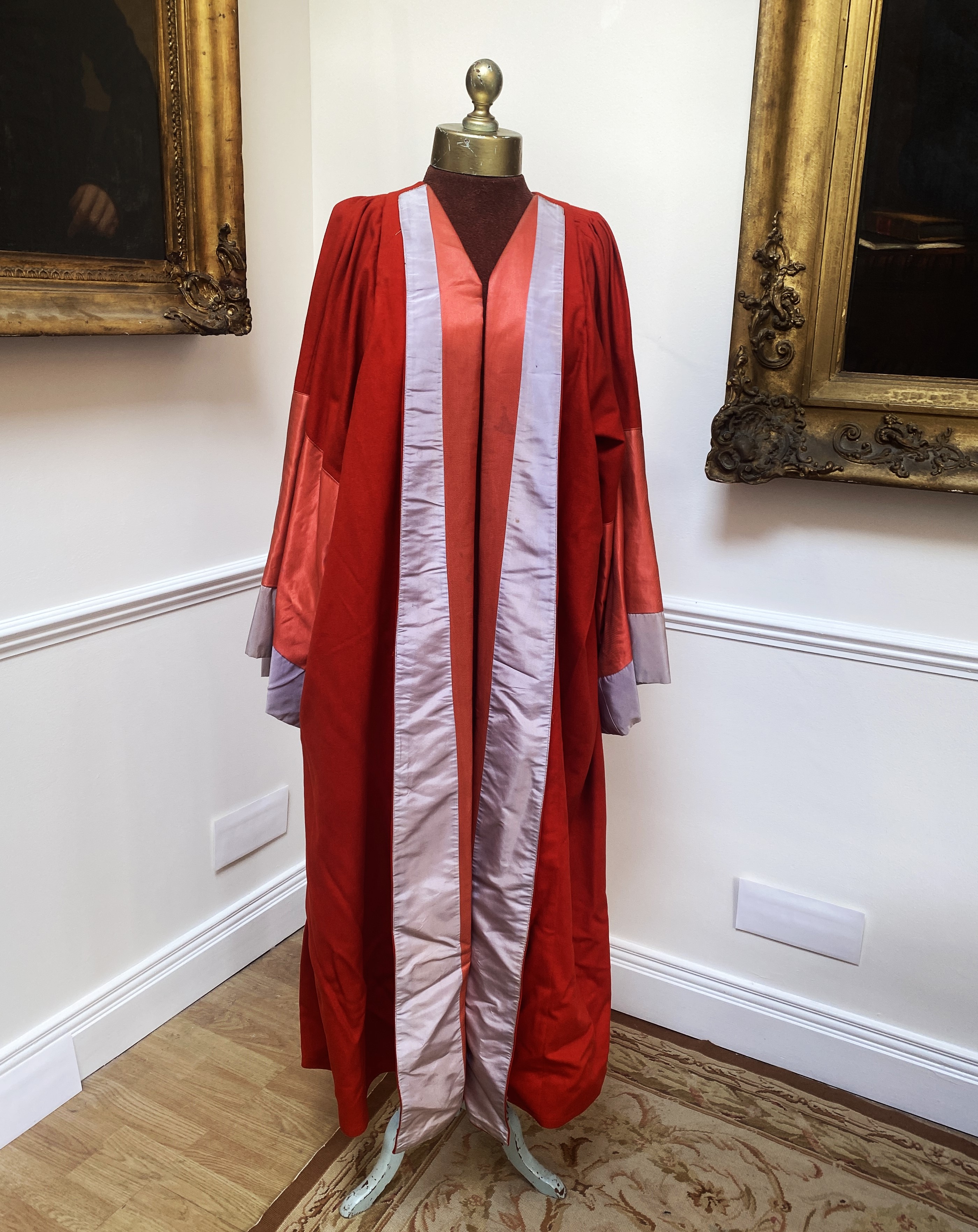 An Academic Robe in red wool and silk trimmings. Size L/M